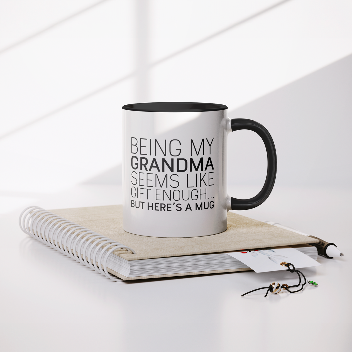 Being_My_Grandma_Seems_Like_Gift_Enough_Mug_Lifestyle_Notebook_Mockup.png_13265732