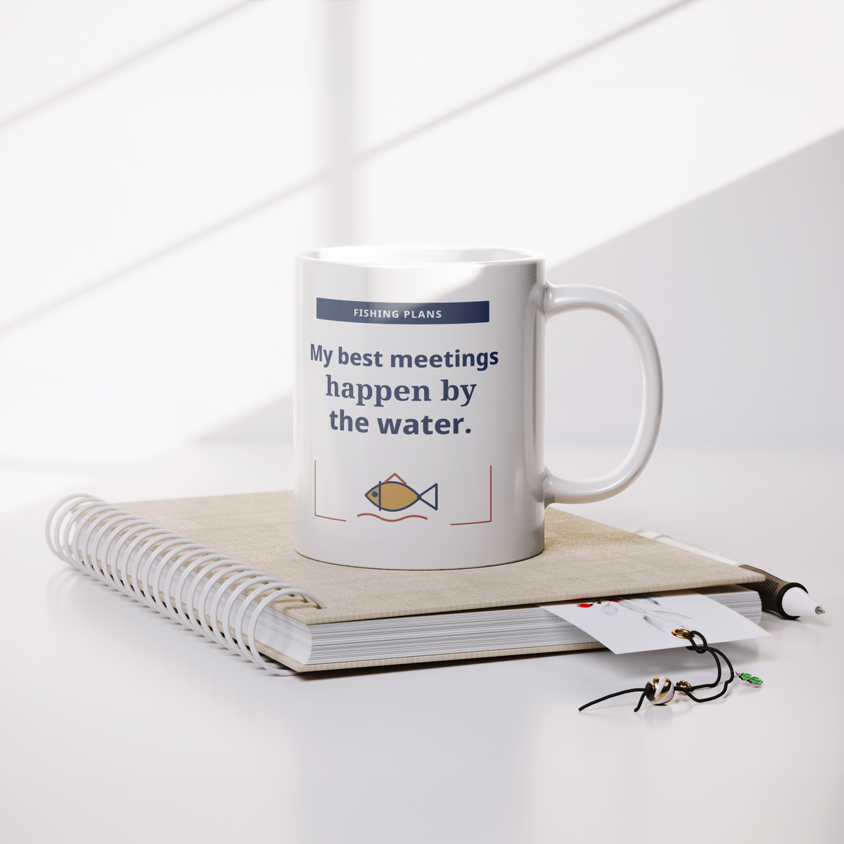 Best_Meetings_by_the_Water_Mug_-_White_1_Lifestyle_Notebook_Mockup.png_16220351