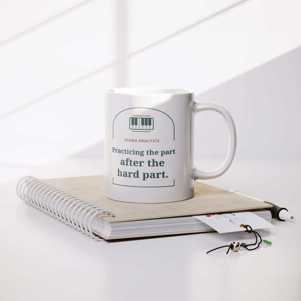 Practicing_Past_the_Hard_Part_Mug_-_Whit_Lifestyle_Notebook_Mockup.png_16220281