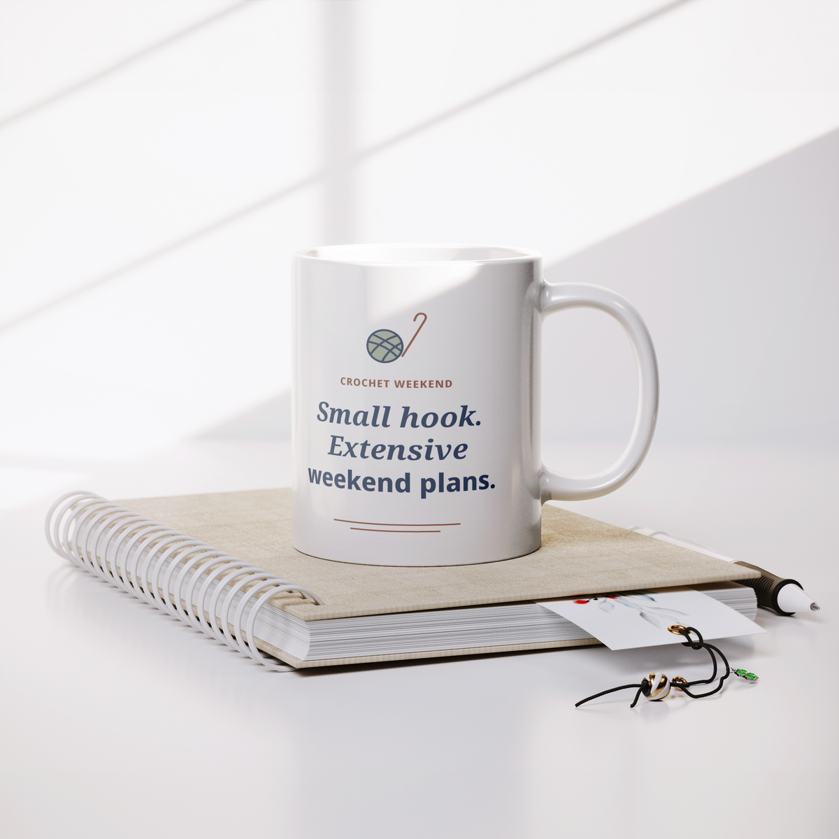 Small_Hook_Extensive_Weekend_Plans_Mug_-_Lifestyle_Notebook_Mockup.png_16220200