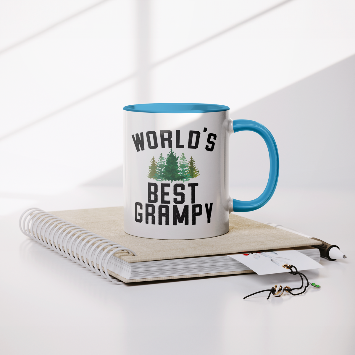 Worlds_Best_Grampy_Forest_Coffee_Mug_Lifestyle_Notebook_Mockup.png_13295246