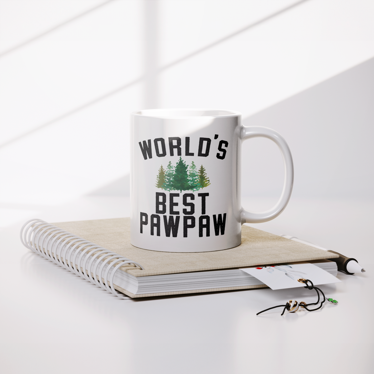 Worlds_Best_Pawpaw_Coffee_Mug_Lifestyle_Notebook_Mockup.png_13236106
