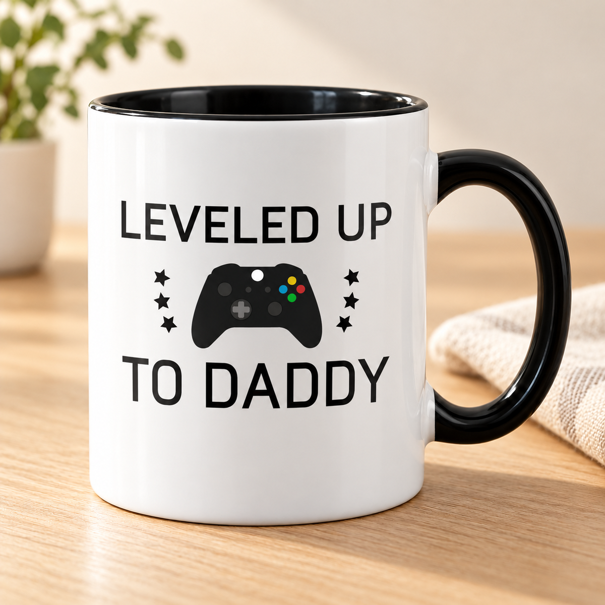 Leveled Up to Daddy Mug for New Dads — Black mug on a sunlit oak table