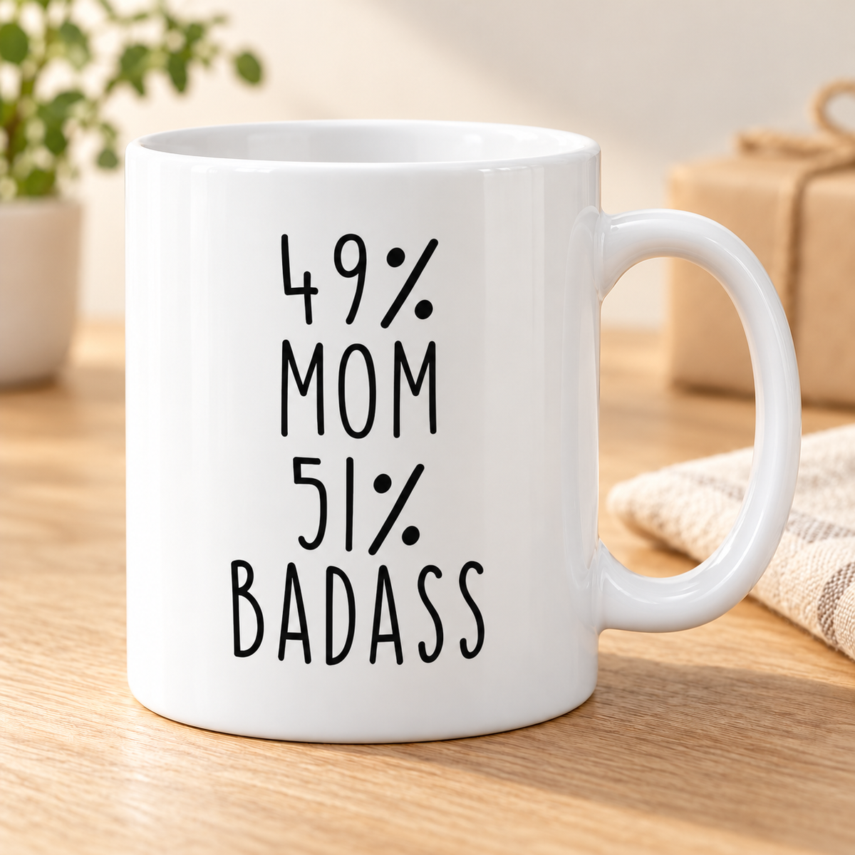 49% Mom 51% Badass Coffee Mug Mother's Day Gifts for Mom — mug on a sunlit oak table