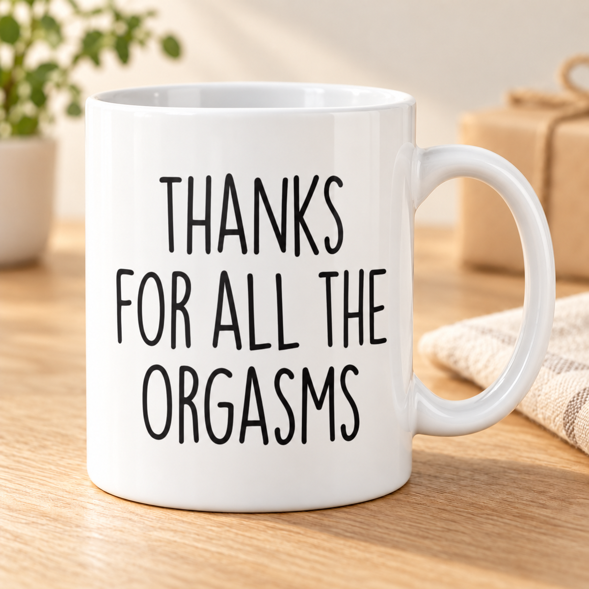 Thanks For All The Orgasms Funny Coffee Mug | Naughty Anniversary Gift — mug on a sunlit oak table