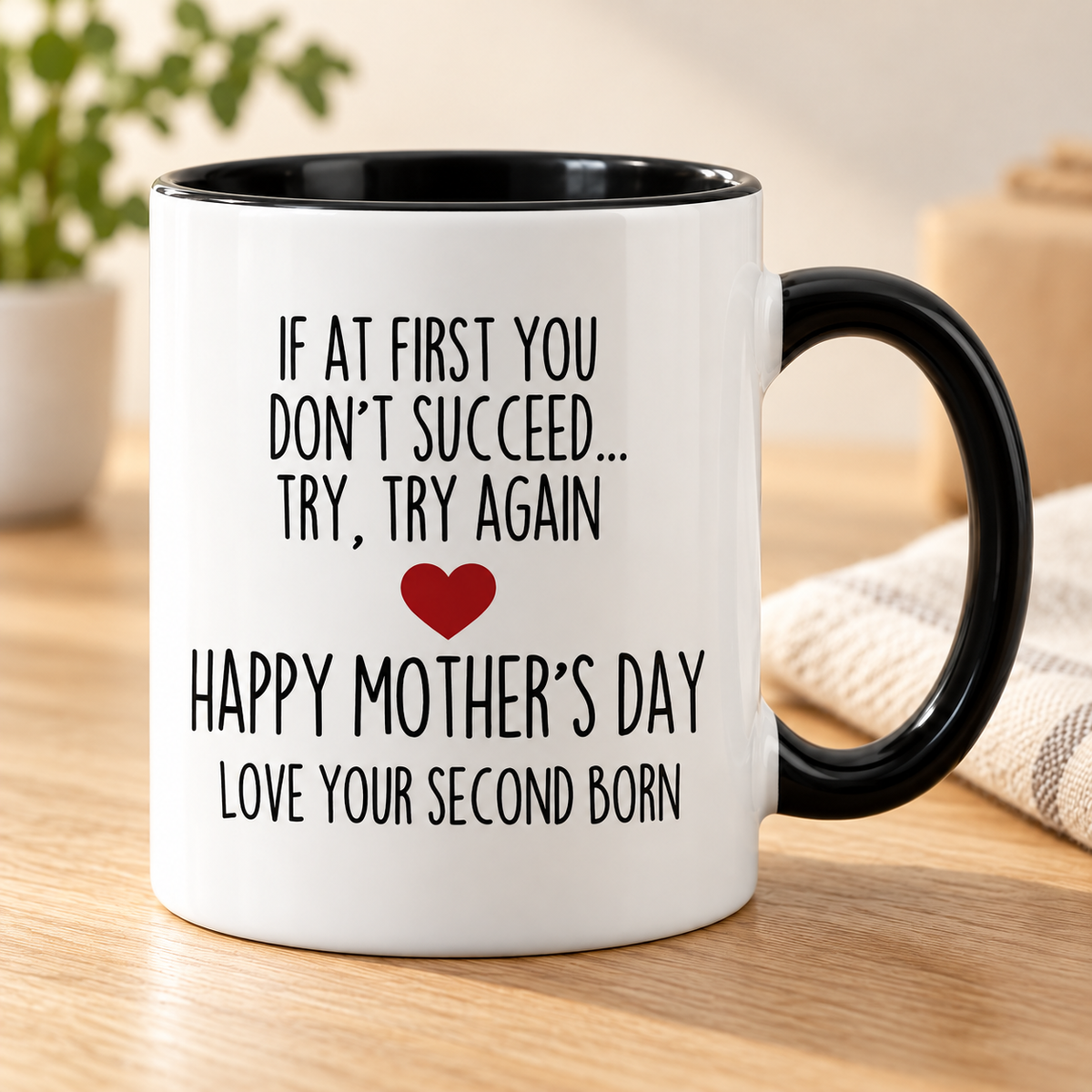 If At First You Don't Succeed Try, Try Again Happy Mother's Day Love Your Second Born Child Mug — Black mug on a sunlit oak table