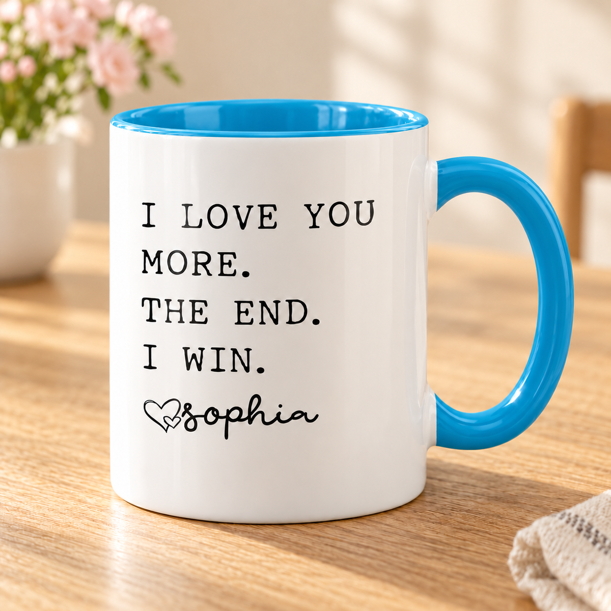 I Love You More Personalized Mug for Mom — Blue mug on a sunlit oak table