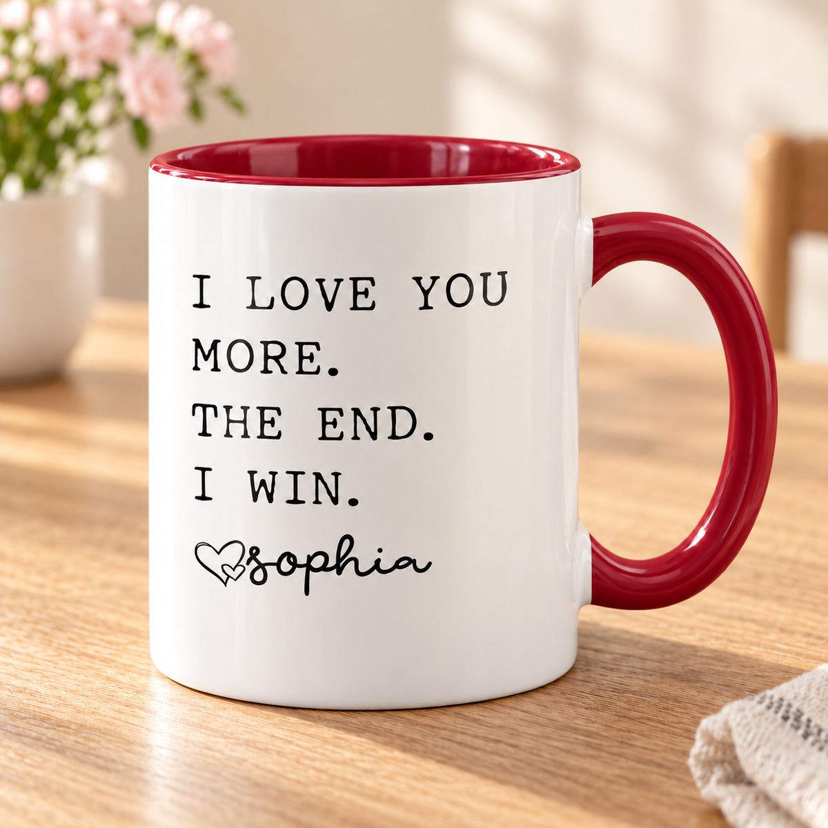 I Love You More Personalized Mug for Mom — Red mug on a sunlit oak table