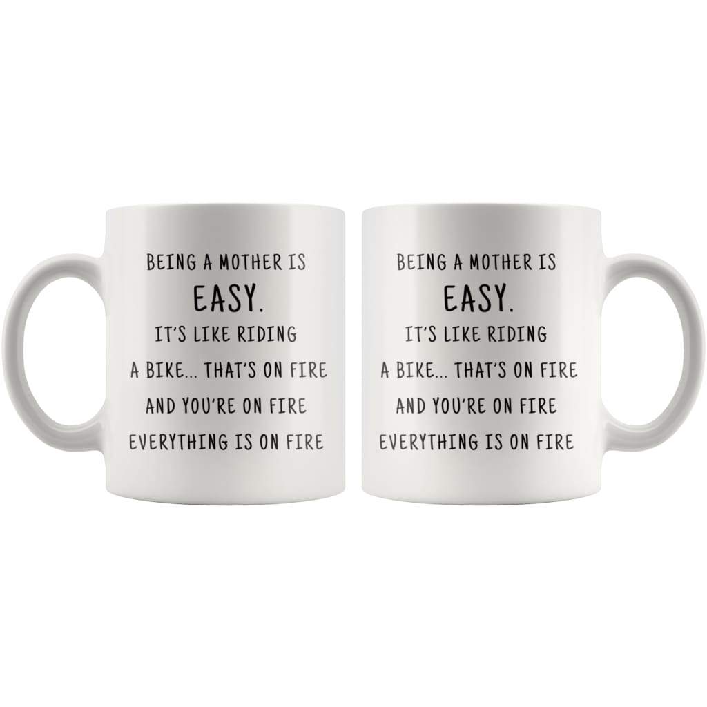Being A Mother Is Easy. It's Like Riding A Bike... That's On Fire. And Your On Fire. Everything Is On Fire Coffee Mug - BackyardPeaks