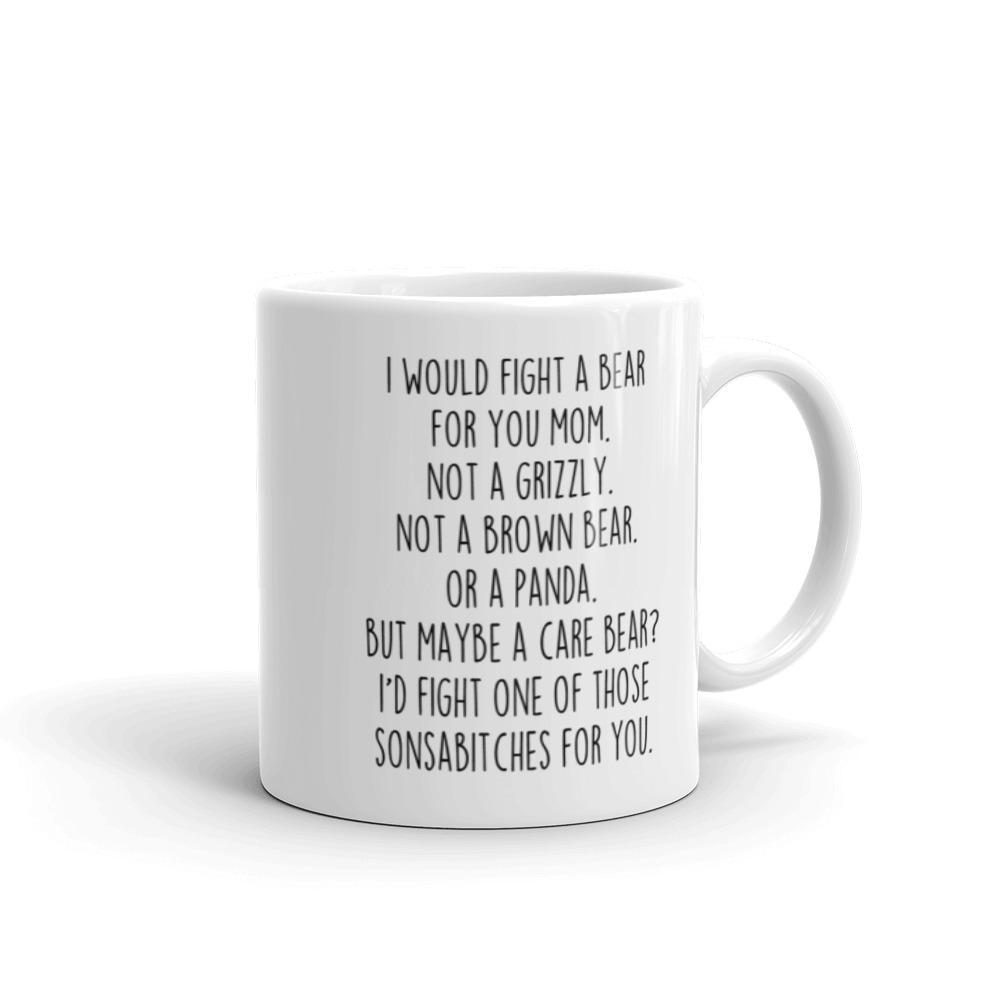 Angled view of the white "I Would Fight a Bear for You Mom" mug with its handle on the right