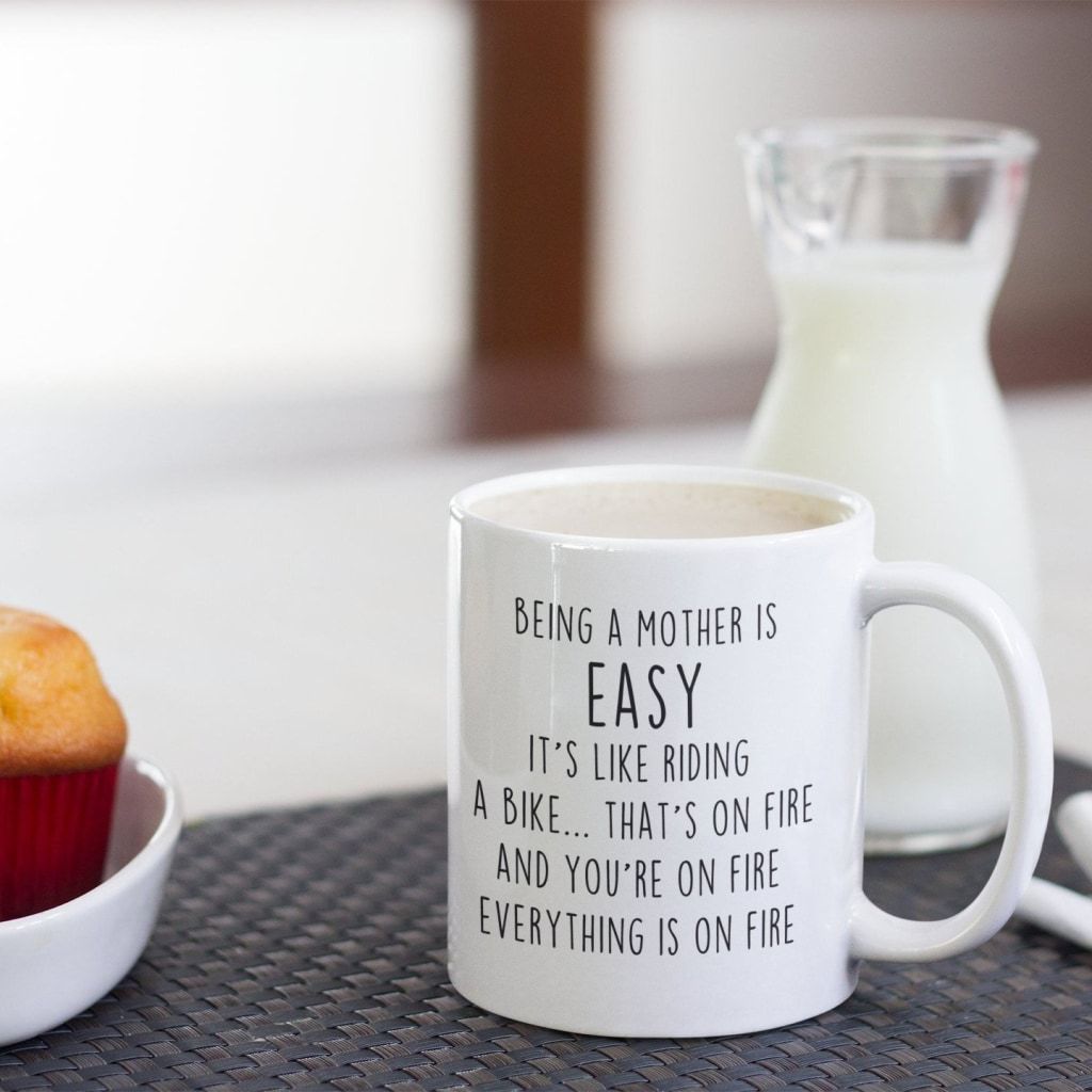 Being A Mother Is Easy. Its Like Riding A Bike... Thats On Fire. And Your On Fire. Everything Is On Fire Coffee Mug $14.99 | Drinkware