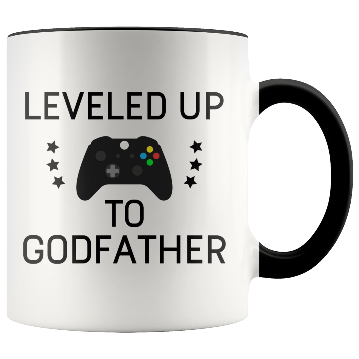White mug with black handle and rim, "Leveled Up to Godfather" lettering, a game controller and stars