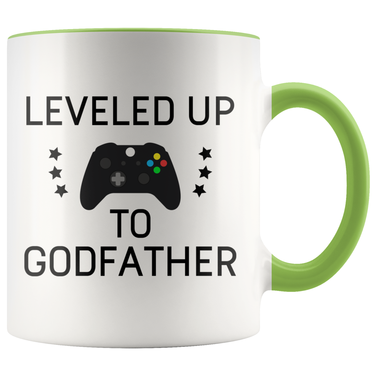 White mug with green handle and rim, "Leveled Up to Godfather" lettering, a game controller and stars