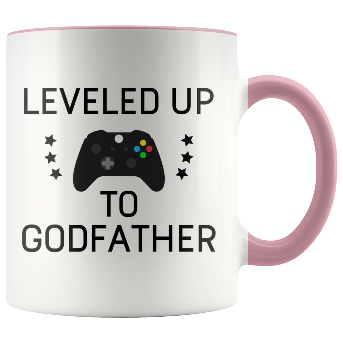 White mug with pink handle and rim, "Leveled Up to Godfather" lettering, a game controller and stars